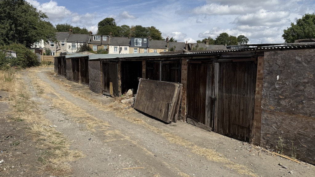 Lot: 76 - GARAGE SITE WITH POTENTIAL - External image of garages at end